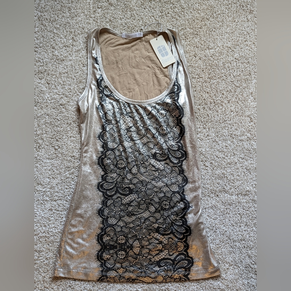 Jaquette BRAND NEW never worn XS gold tank with black lace design.